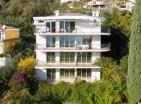 Luxuriöse 107 m2 große Wohnung mit drei Schlafzimmern in Đenovići mit Panoramablick auf die Bucht